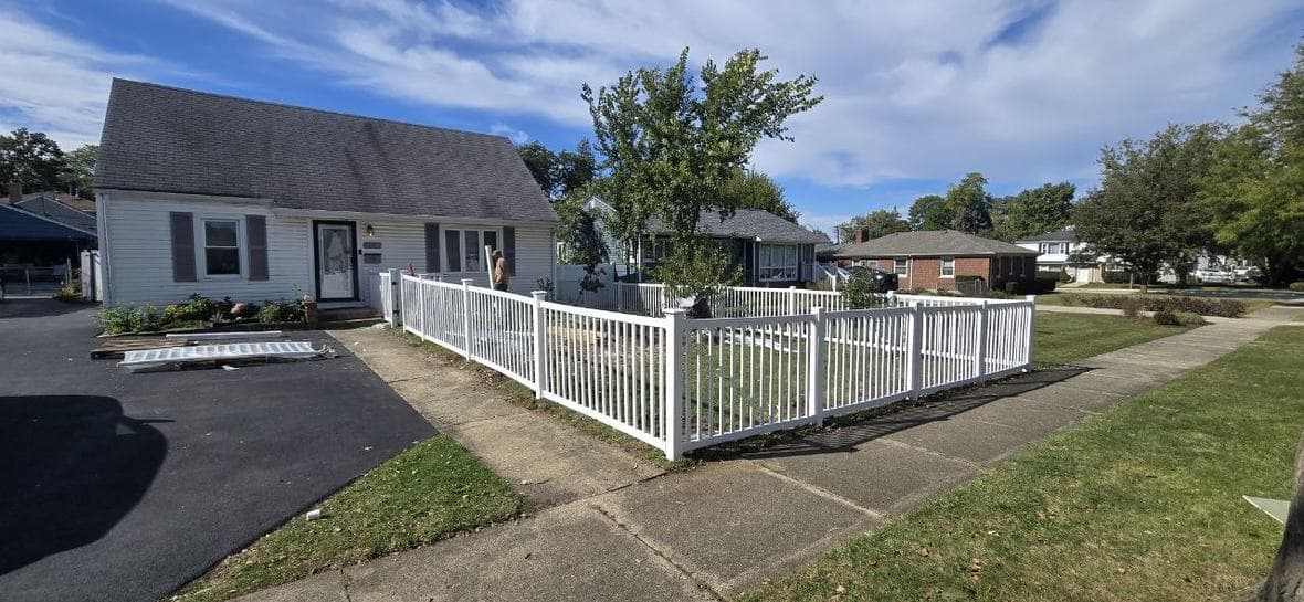 White vinyl front yard fence installation completed by BAX
